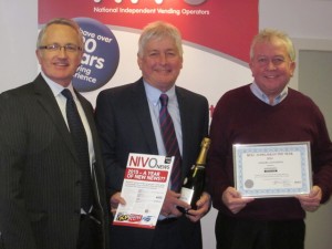Mike Hadfield and John Crichton from Automatic retailing receive their award